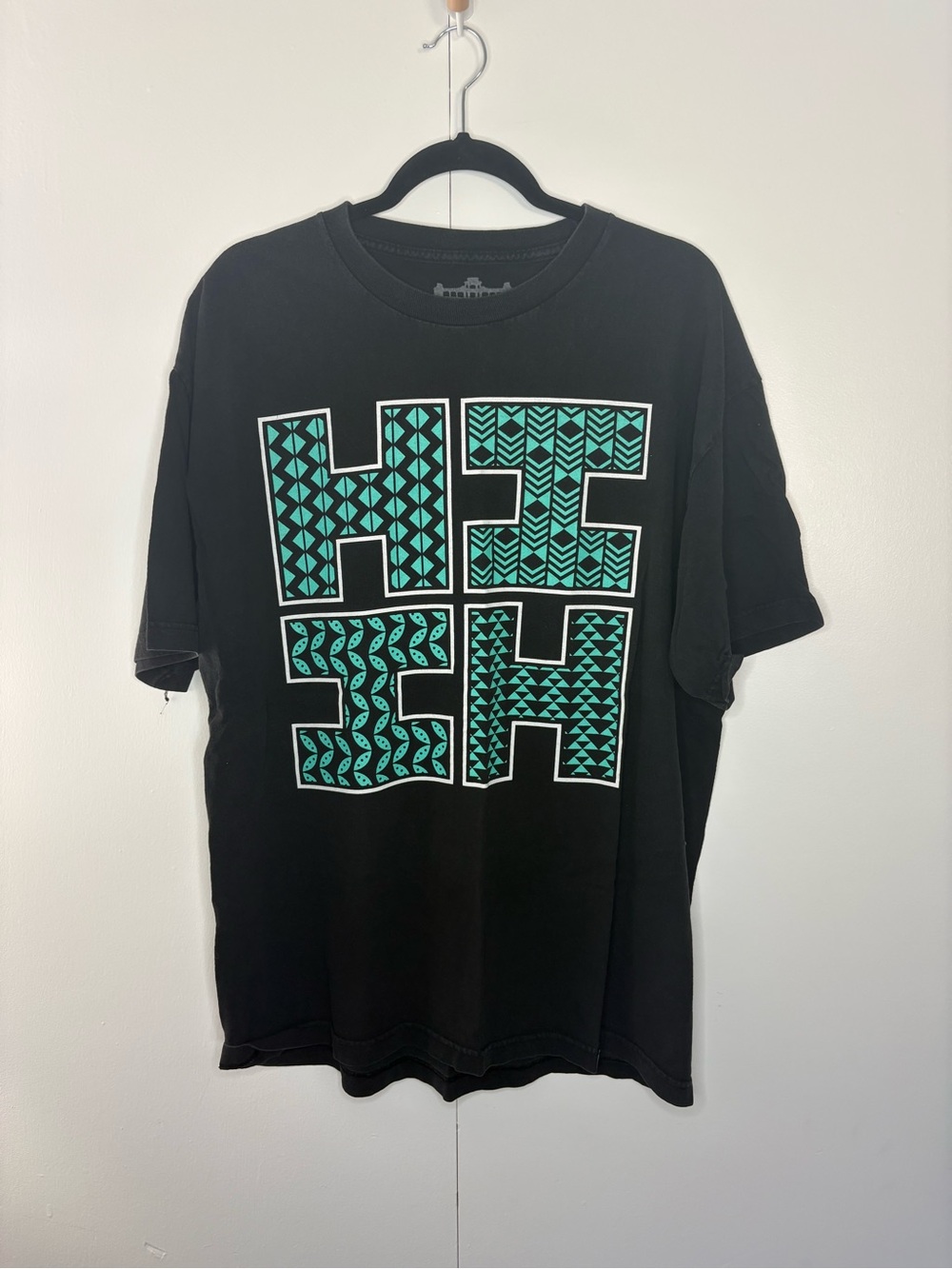 Hawaiis Finest Men's Black Graphic Tee with Teal Pattern